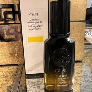 Brand new never used Oribe gold lust hair oil